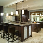 The kitchen team functionality with heavy, monolithic lines cabinetry, countertop, cuisine classique, flooring, interior design, kitchen, room, wood flooring, black