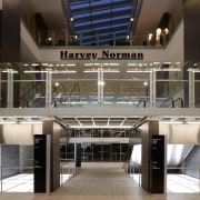 A view of the Harvey Norman Centre designed architecture, building, daylighting, interior design, lobby, shopping mall, black, gray