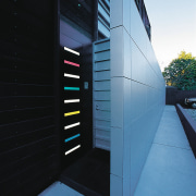 An exterior view of this contemporary home designed architecture, building, daylighting, facade, glass, house, window, black, teal