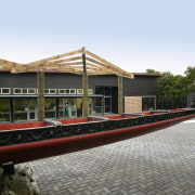 A view of the Te Puia Marae built building, white, gray