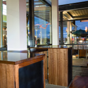 A view of the Garrison Public house bar interior design, restaurant, wood, brown, black