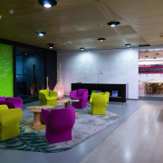 A view of this office breakout area featuring architecture, ceiling, interior design, lobby, table, gray
