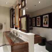 A view of a bar at Sylvia Park ceiling, countertop, floor, flooring, furniture, interior design, living room, real estate, room, table, gray