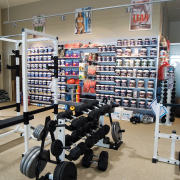 A view of a fitness store in Sylvia gym, physical fitness, retail, room, sport venue, structure, weight training, gray