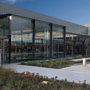 A view of the Queenstown Airport designed by architecture, building, commercial building, corporate headquarters, facade, headquarters, house, mixed use, real estate, black, gray