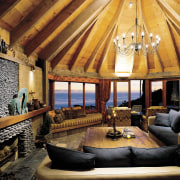 An interior view of the living area featuring ceiling, estate, home, interior design, living room, property, real estate, room, wood