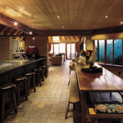 An interior view of the living areas featuring interior design, restaurant, brown, red