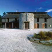 An exterior view of this rural home designed cottage, estate, facade, farmhouse, home, house, property, real estate, sky, villa