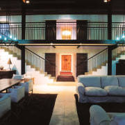 An interior view of the living areas featuring ceiling, home, house, interior design, living room, lobby, real estate, room, black