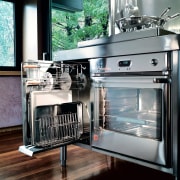 A view of this kitchen featuring stainless steel furniture, gas stove, home appliance, kitchen, kitchen appliance, kitchen stove, major appliance, oven, small appliance, gray, black