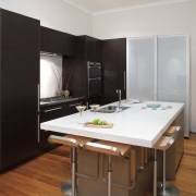 A view of the modern Smeg stainless steel furniture, interior design, kitchen, room, gray, black