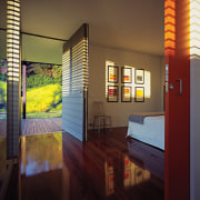 A view of the hallway featuring polished recycled architecture, home, house, interior design, real estate, room, window, brown, red