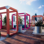 An exterior view of the patio area. - deck, outdoor structure, pergola, wood, white, red