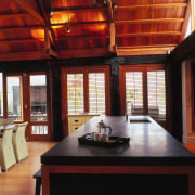 A interior view of the open plan living ceiling, countertop, interior design, kitchen, real estate, black, red