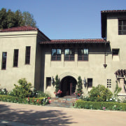 This spanish-style residence was transformed by the Landry building, estate, facade, home, house, mansion, tree, window, black