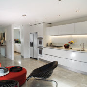 A view of this kitchen featuring the latest ceiling, floor, interior design, kitchen, living room, real estate, room, gray