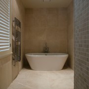 A view of the NKBA Award wining bathroom bathroom, floor, flooring, interior design, plumbing fixture, property, real estate, room, tile, wall, brown, gray