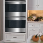 The latest E Line range is displayed in gas stove, home appliance, kitchen, kitchen appliance, kitchen stove, major appliance, microwave oven, oven, refrigerator, gray