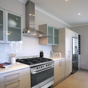 A view of some appliances from Fisher and cabinetry, countertop, cuisine classique, interior design, kitchen, room, gray