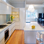 A view of the this kitchen designed by countertop, interior design, kitchen, real estate, room, gray