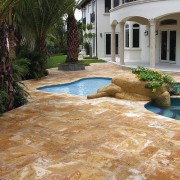 A view of Marble and travetine pavers with backyard, driveway, estate, flagstone, floor, flooring, home, landscape, landscaping, outdoor structure, patio, real estate, walkway, brown, orange