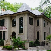 Located in Chicago's North Shore, this house was architecture, building, cottage, estate, facade, historic house, home, house, mansion, neighbourhood, property, real estate, tree, gray