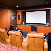 A view of this custome home theatre feautring entertainment, home, interior design, room, brown, black