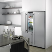 A view of this kitchen featuring a refrigerator home appliance, kitchen, kitchen appliance, major appliance, product design, refrigerator, small appliance, gray, white