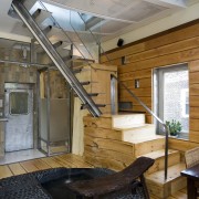 An interior view of the living area feauting architecture, ceiling, daylighting, house, interior design, roof, wood, gray