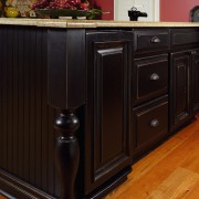 Customers are able to achieve a custom look cabinetry, chest of drawers, countertop, drawer, floor, flooring, furniture, hardwood, kitchen, sideboard, wood, wood stain, black