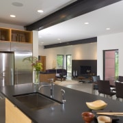 clean lines and smooth surfaces provide this kitchen countertop, interior design, kitchen, real estate, gray