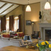 A view of the interior living area featuring ceiling, home, interior design, living room, lobby, real estate, room, window, brown