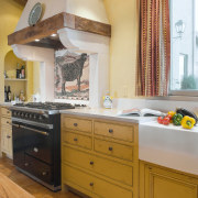 An interior view of the kitchen and dining cabinetry, countertop, cuisine classique, floor, furniture, home, interior design, kitchen, room, brown, orange