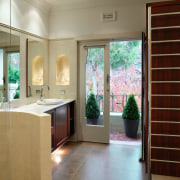 A view of the master ensuite, tiled floors bathroom, door, estate, floor, flooring, home, house, interior design, real estate, room, window, brown