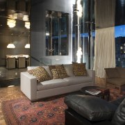 An interior view of this apartment living area couch, furniture, interior design, living room, lobby, room, black