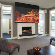 These homes by developer Parkside Properties feature the fireplace, hearth, home, interior design, living room, room, wood burning stove, gray