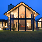 Open to the elements - architect Ken Warburton's architecture, building, cottage, elevation, estate, facade, farmhouse, home, house, lighting, property, real estate, residential area, roof, sky, villa, window, blue, black