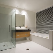 Cantilevered fixtures and fittings and clean, white lines bathroom, interior design, room, gray