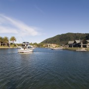 View of new canal-front properties by Hopper Developments. bay, boat, boating, cape, coast, coastal and oceanic landforms, cove, inlet, lake, loch, marina, reservoir, river, sea, sky, tourism, water, water resources, water transportation, waterway, teal
