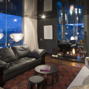 An interior view of this apartment living area ceiling, home, interior design, lighting, living room, room, suite, black