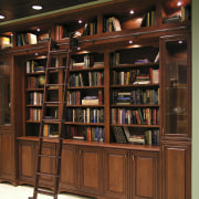 A view of the remodelled interior of this bookcase, cabinetry, furniture, institution, library, public library, shelf, shelving, brown