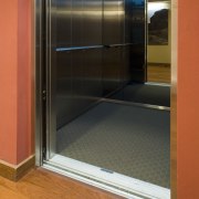 To provide a highly durable stain resistant carpet, door, floor, glass, orange, black
