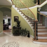 Atlanta Design &amp; Build's principal designer Dale Contant baluster, estate, floor, flooring, handrail, hardwood, home, interior design, laminate flooring, lobby, property, real estate, stairs, tile, wood flooring, gray, brown