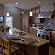 A view of a kitchen designed by Drury cabinetry, countertop, cuisine classique, interior design, kitchen, real estate, room, brown, gray