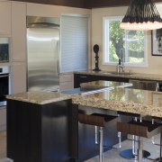 A view of a kitchen designed by Blue cabinetry, countertop, cuisine classique, interior design, kitchen, room, gray, black