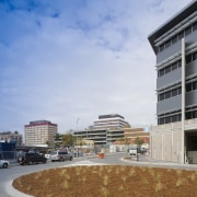 An exterior view of the Greensquare builing and architecture, building, city, cloud, condominium, corporate headquarters, daytime, downtown, facade, headquarters, metropolis, metropolitan area, mixed use, neighbourhood, real estate, residential area, sky, suburb, tower block, urban area