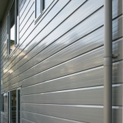A view of some cladding from Ullrich Aluminium. daylighting, facade, house, line, siding, structure, wall, window, gray, white