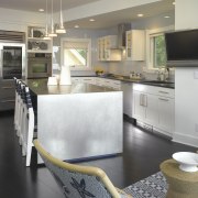 A view of the interior of the kitchen countertop, floor, flooring, interior design, kitchen, room, gray