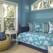 A view of the spare bedroom featuring aqua bed, bed frame, bed sheet, bedding, bedroom, blue, estate, furniture, home, interior design, living room, mattress, real estate, room, textile, wall, window, teal, white