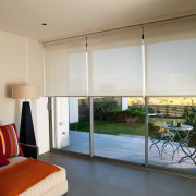 A view of the interior of this Magenta ceiling, curtain, door, home, interior design, living room, real estate, room, shade, sliding door, window, window blind, window covering, window treatment, gray
